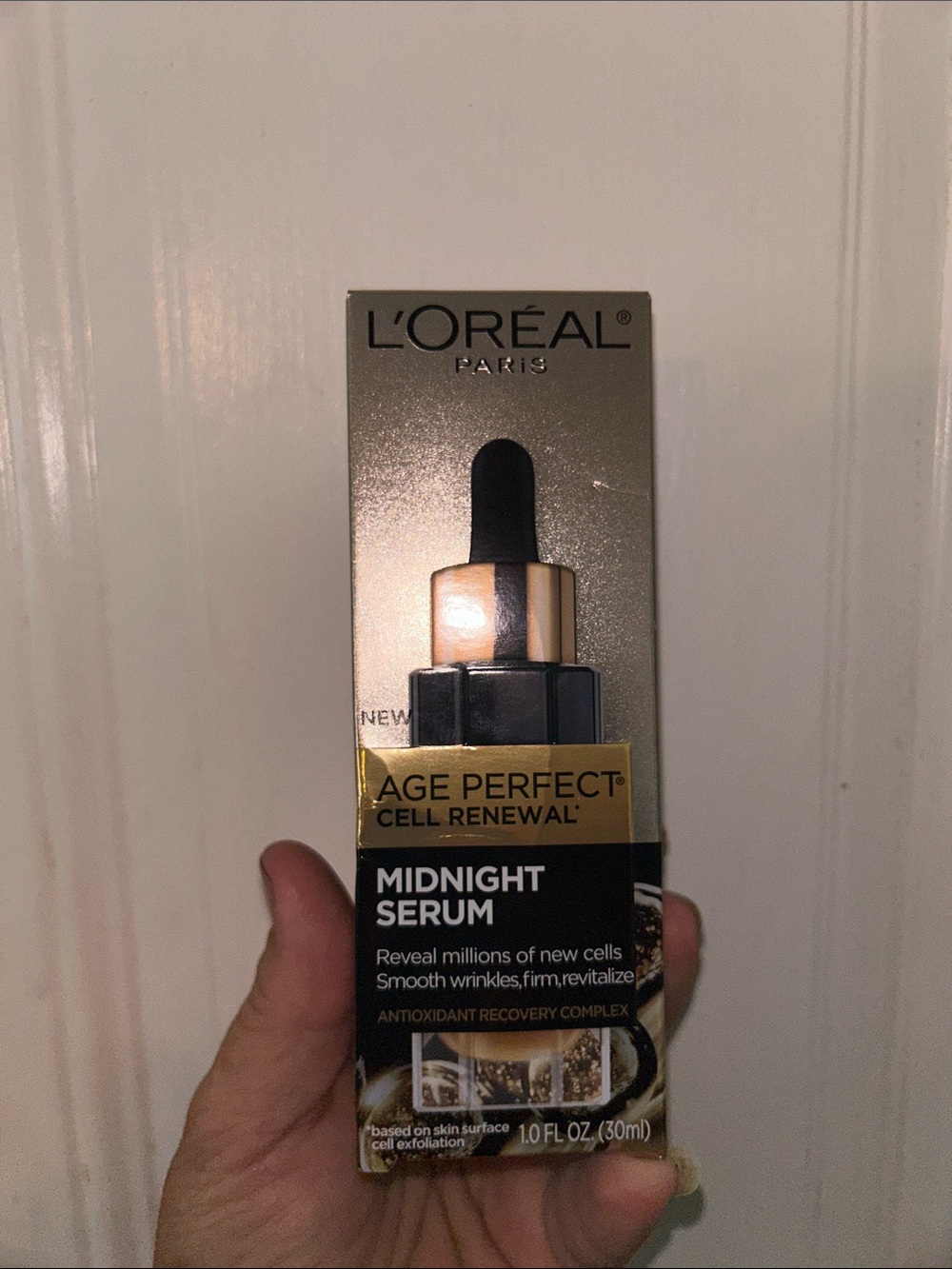 L'Oreal Midnight Serum Bottle in Gold and Black